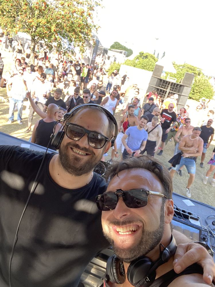 Selfie behind the decks with an open-air festival crowd